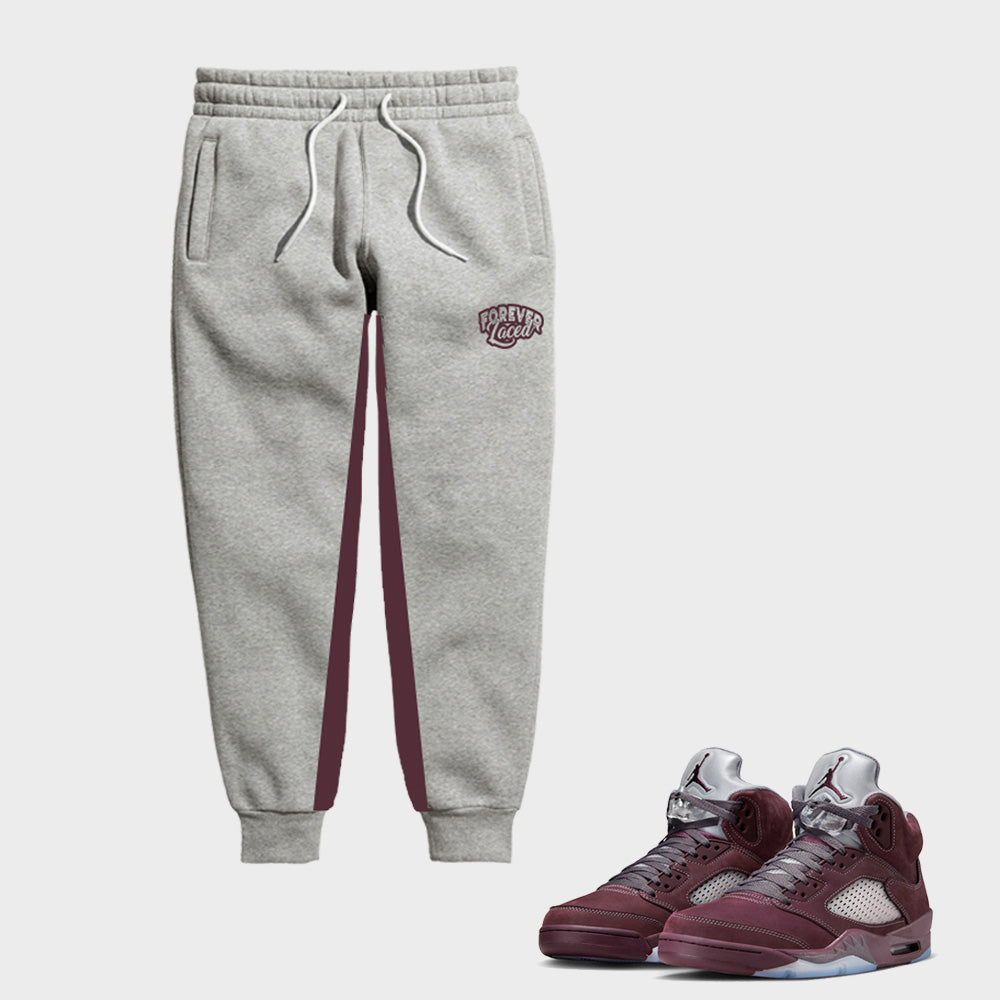 Forever Laced Joggers to match Retro Jordan 5 Burgundy sneakers