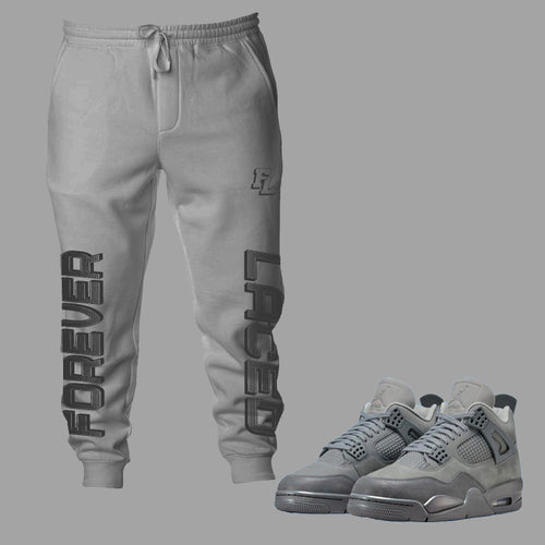 Forever Laced FL Sweatpants to match Retro Jordan 4 Wet Cement sneakers